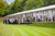 Verity-Milligan-Garsington-135-2023-07-19-1920 Audience members on their way into the glass-fronted restaurant tent
