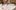 Web-Resize-Banquet-Table-Placeholder Glasses set on a banquet table with fairy lights in the background