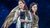 GOSemele2017JP_03617-Edit A woman dressed in gold with large gold wings gives a woman in a silver jacket side-eye.